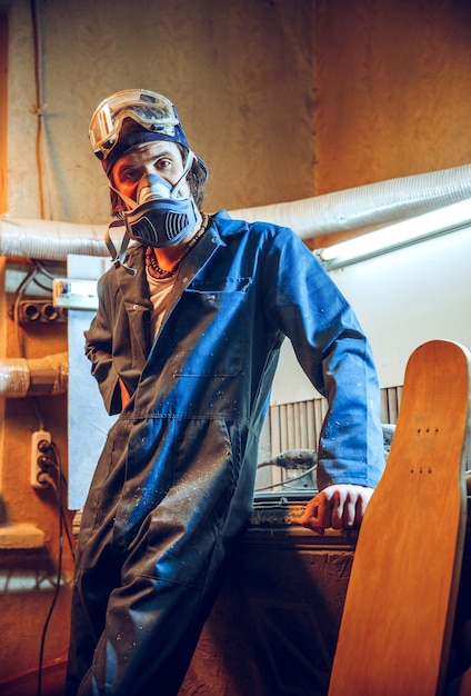 Portrait of serious carpenter at his work place