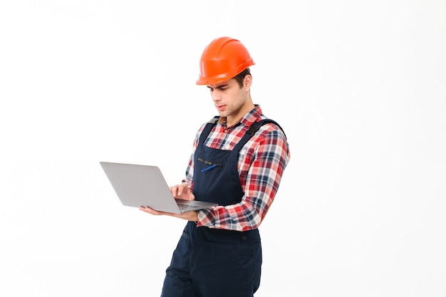 Free Photo portrait of a serious young male builder