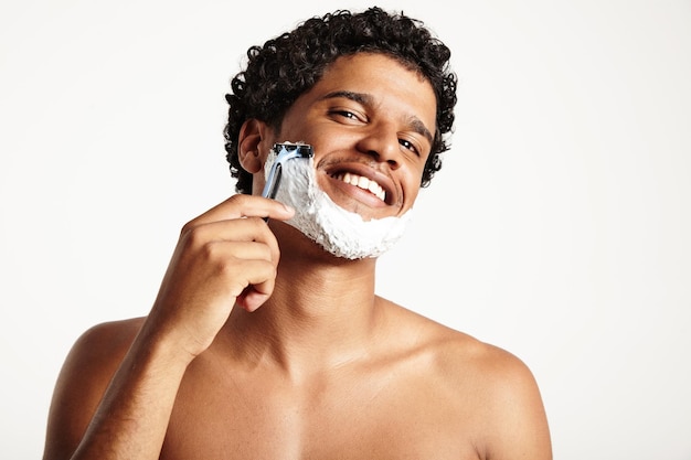 Portrait of a shaving man