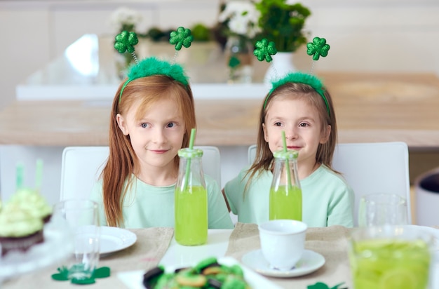 Portrait of siblings at irish party