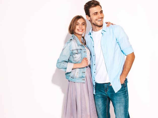 Portrait of Smiling Beautiful Girl and her Handsome Boyfriend laughing.