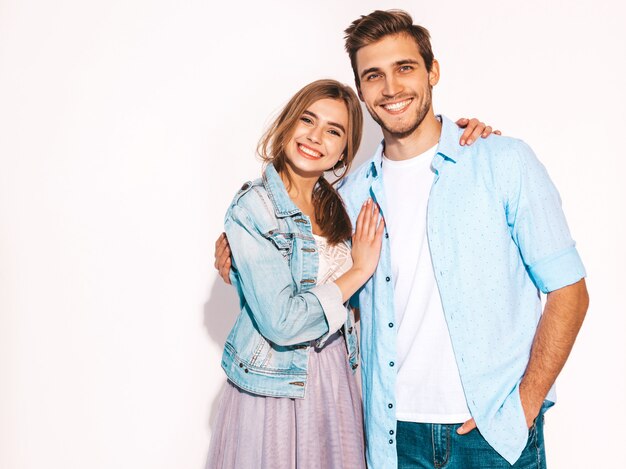 Portrait of Smiling Beautiful Girl and her Handsome Boyfriend laughing.