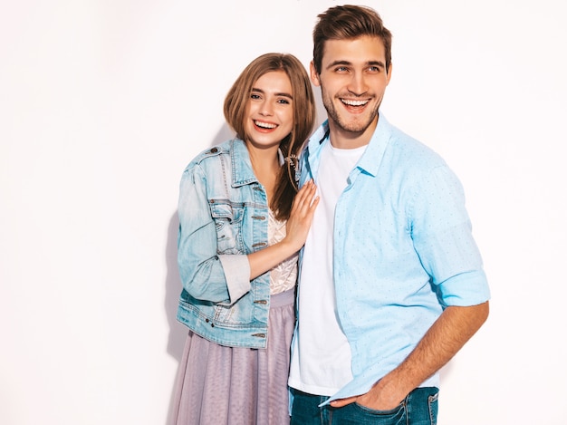 Portrait of Smiling Beautiful Girl and her Handsome Boyfriend laughing.