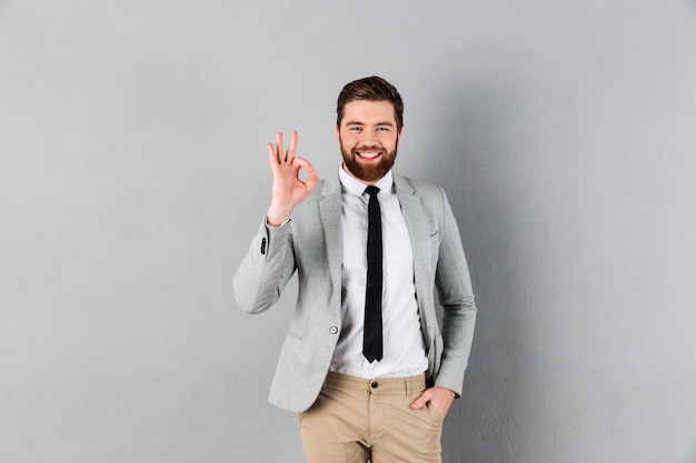 Portrait of a smiling businessman dressed in suit