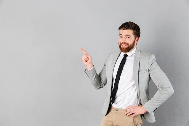 Portrait of a smiling businessman dressed in suit