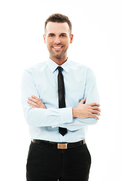 Free photo portrait of smiling businessman with arms crossed