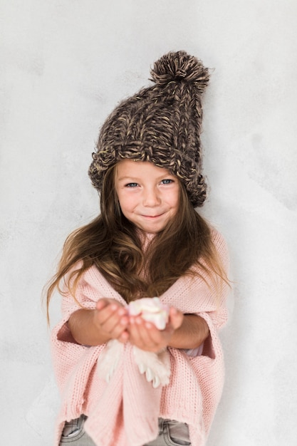 Portrait of smiling girl winter dressed