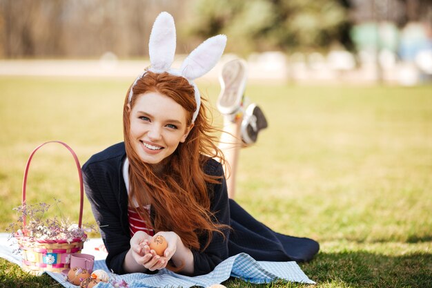 Portrait of a smiling happy red head woman