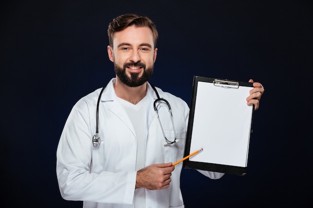 Portrait of a smiling male doctor dressed in uniform