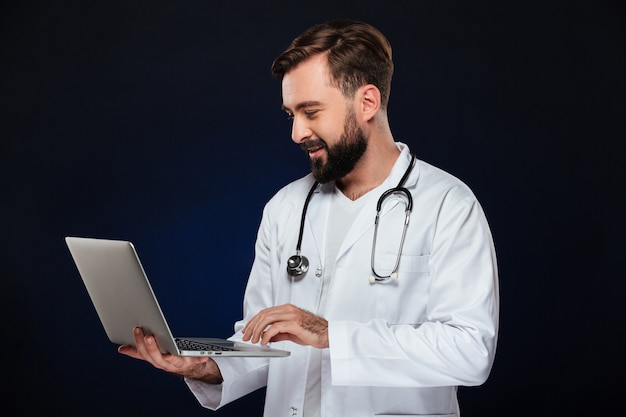 Portrait of a smiling male doctor dressed in uniform