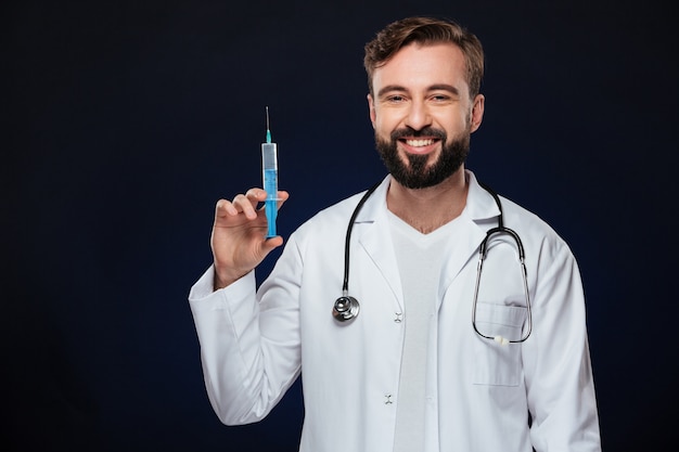 Portrait of a smiling male doctor dressed in uniform