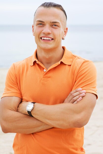 Portrait of smiling man on the beach