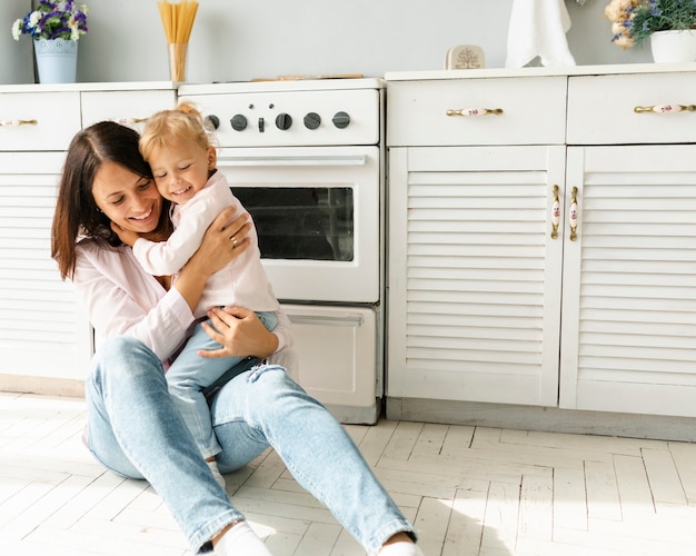 Portrait of smiling mother and daughter