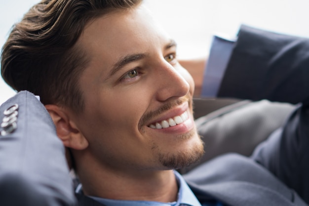 Free photo portrait of smiling successful young businessman