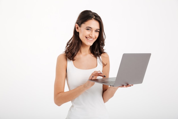 Portrait of a smiling woman dressed in tank-top