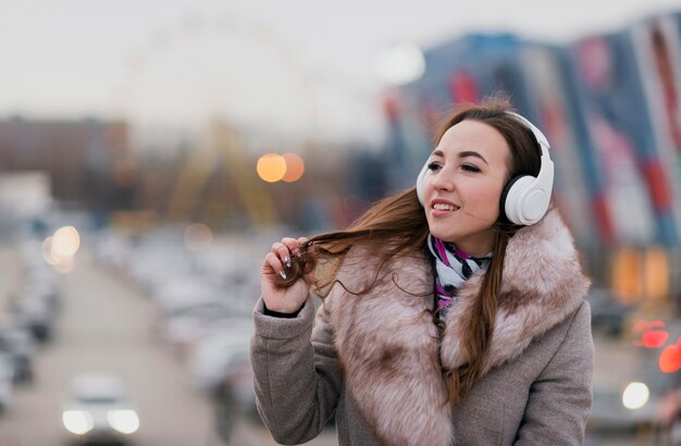 Portrait of smiling woman with headphones