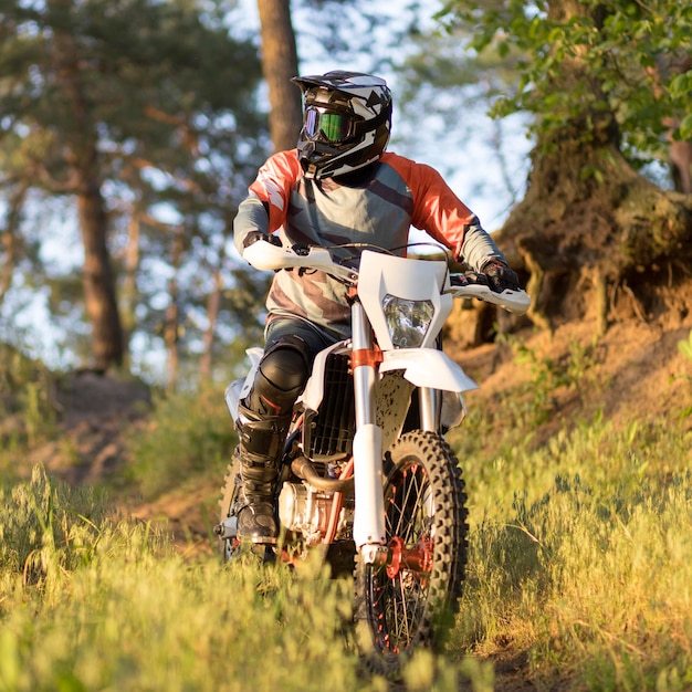 Portrait of stylish man enjoying motorbike ride