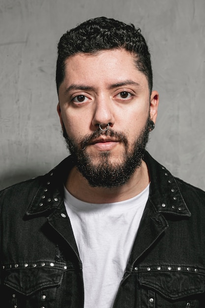 Portrait of stylish man looking at photographer