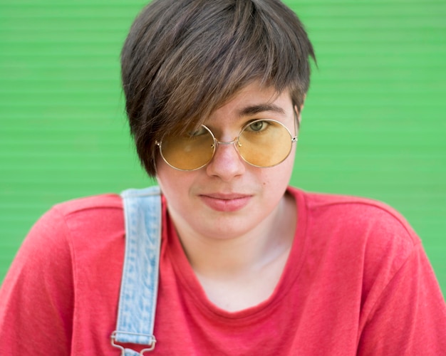 Portrait of stylish young boy wearing sunglasses