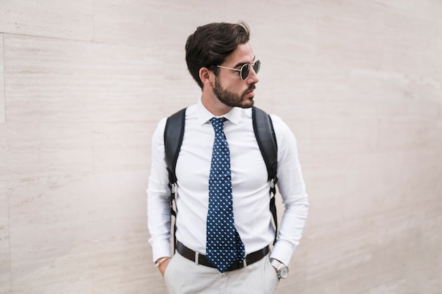 Free Photo portrait of a stylish young man in sunglasses