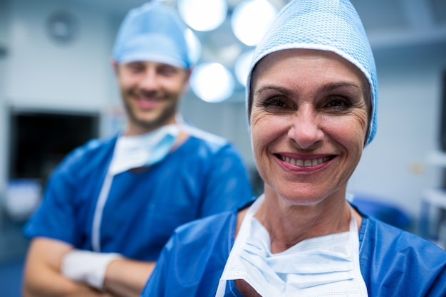 Portrait of surgeons standing in operation room