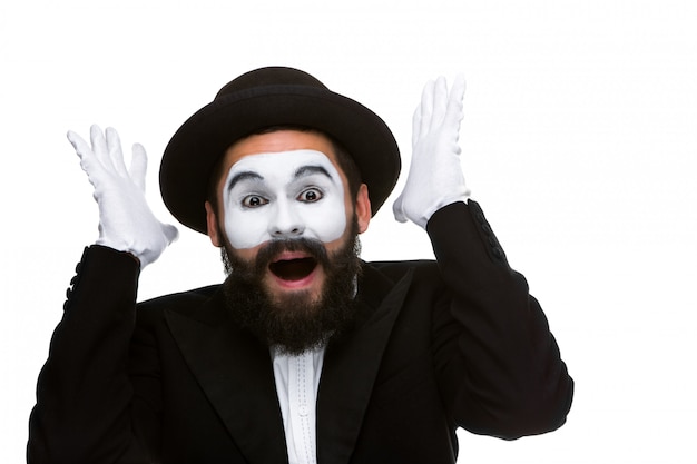 Portrait of the surprised and joyful mime with open mouth