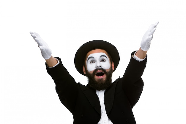 Portrait of the surprised and joyful mime with open mouth