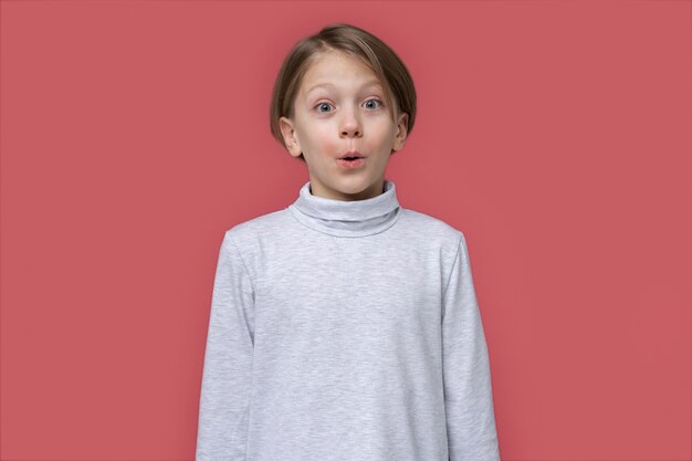 Portrait of teenage girl looking surprised