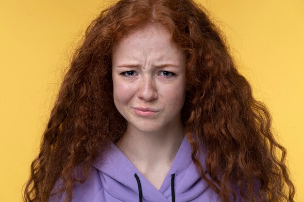 Portrait of teenage girl looking upset