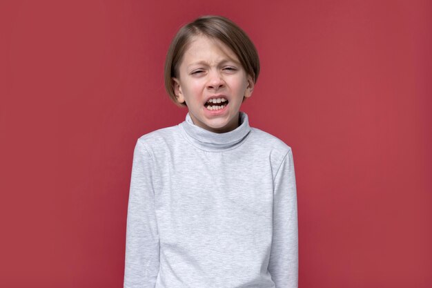 Portrait of teenage girl looking upset