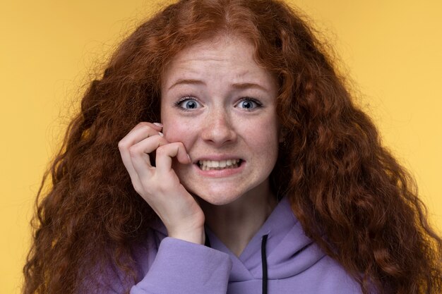 Portrait of teenage girl looking worried