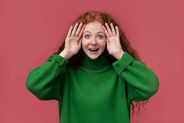 Free Photo portrait of teenage girl playing pick a boo