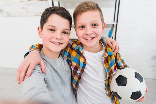 Portrait of two boys at home