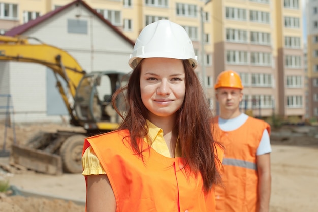 Portrait of two builders