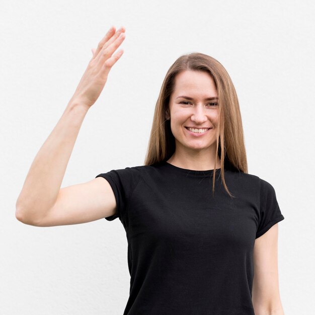 Portrait of woman communicating through sign language