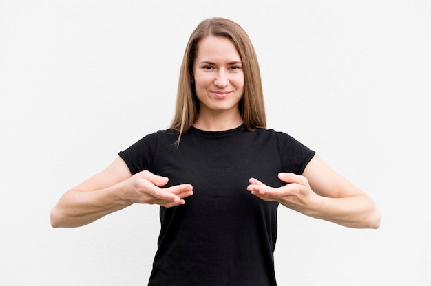 Free Photo portrait of woman communicating through sign language