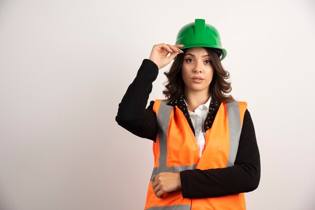 Portrait of woman engineer on white