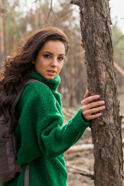 Free photo portrait woman in forest