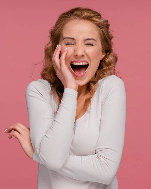 Free photo portrait woman laughing