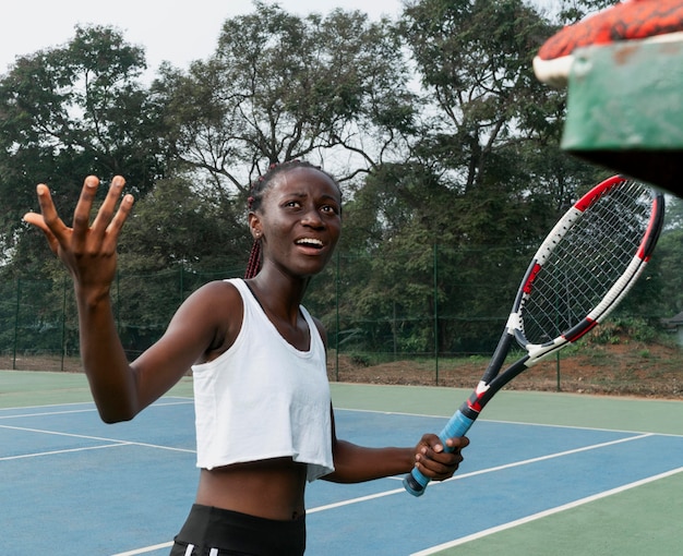 Portrait woman playing tennis