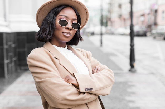 Portrait of woman posing outside