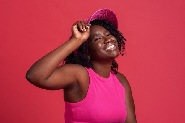 Portrait of woman posing with simple background