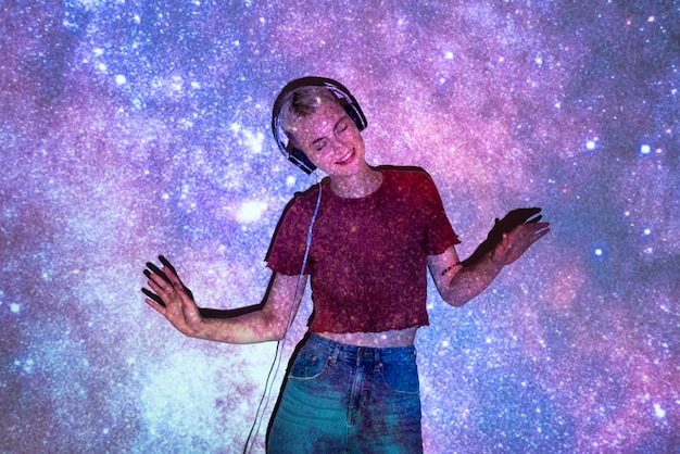 Free Photo portrait of woman posing with universe projection texture