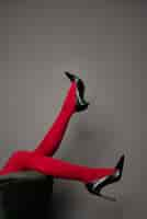 Free photo portrait of woman's legs with stylish high heels and pantyhose