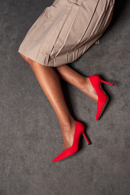 Portrait of woman's legs with stylish high heels and pantyhose