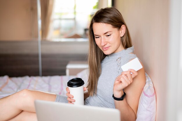 Portrait of woman shopping online