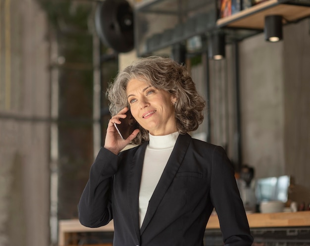 Portrait woman talking on mobile