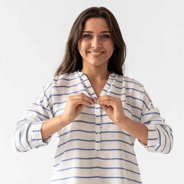 Portrait of woman teaching sign language