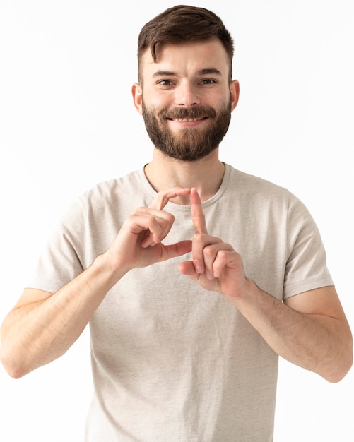 Portrait of woman teaching sign language