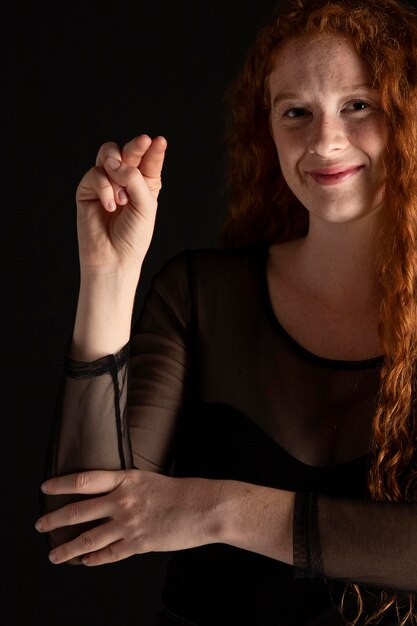 Portrait of a woman teaching sign language